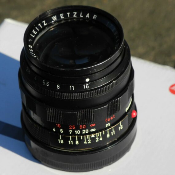 Leica 50/1,4 Summilux Black Paint, Brass Mount lens Sold with hood & caps. SOLD