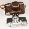 Melcon silver chrome camera Sold With: 5cm f2 Nikkor-H-C "Nippon-Kogaku" Lens & with original case Ex+/++