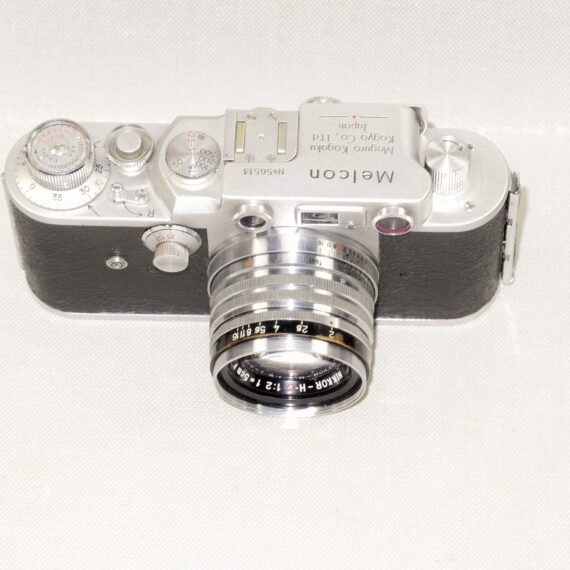 Melcon silver chrome camera Sold With: 5cm f2 Nikkor-H-C "Nippon-Kogaku" Lens & with original case Ex+/++