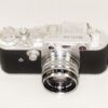 Melcon silver chrome camera Sold With: 5cm f2 Nikkor-H-C "Nippon-Kogaku" Lens & with original case Ex+/++