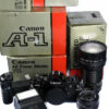 Canon A1 Black camera set with 2 lenses,  canon winder & speedlight Ex++/Mint-