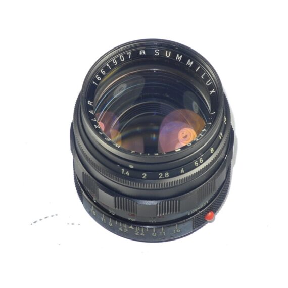 Leica 50/1,4 summilux M black paint early version brass mount lens sold with: Leica hood,caps,Leica lens case ! / RARE SOLD