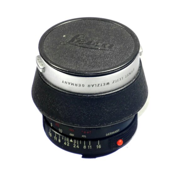 Leica 50/1,4 summilux M black paint early version brass mount lens sold with: Leica hood,caps,Leica lens case ! / RARE SOLD