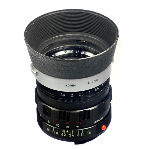 Leica 50/1,4 summilux M black paint early version brass mount lens sold with: Leica hood,caps,Leica lens case ! / RARE SOLD