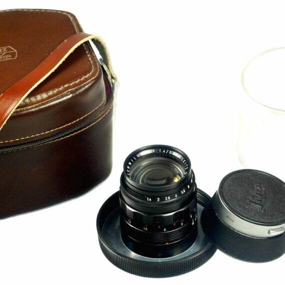 Leica 50/1,4 summilux M black paint early version brass mount lens sold with: Leica hood,caps,Leica lens case ! / RARE SOLD