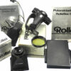 Rollei SLX camera w.80mm lens,prism finder,2 grips,Pol back Mint-