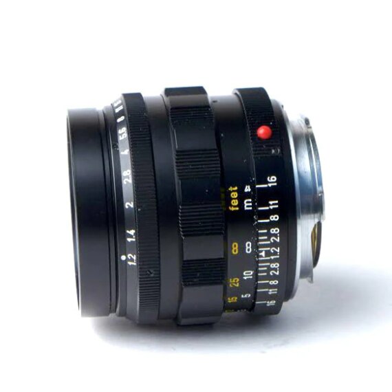 Leica 50/1,2 Noctilux RARE Lens  & Leica caps Mint- / Sold