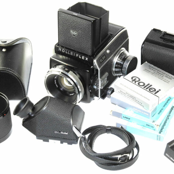 Rollei SL 66 camera with Rollei 80/2,8 planar lens, Rollei prism finder, Extra backs  in system case Ex++/Mint-