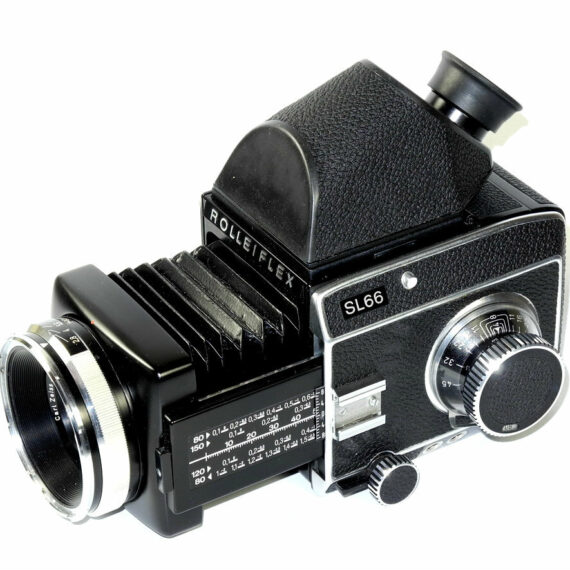 Rollei SL 66 camera with Rollei 80/2,8 planar lens, Rollei prism finder, Extra backs  in system case Ex++/Mint-