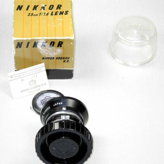 Nikon 3,5cm f1,8 W-Nikkor "Nippon-Kugaku" with  Original Nikon hood,card,caps,box Mint-