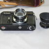 Nikon SP black paint camera with Nikon 5cm f1,4mm lens with case,hood and caps NICE & RARE ! Call or email for price