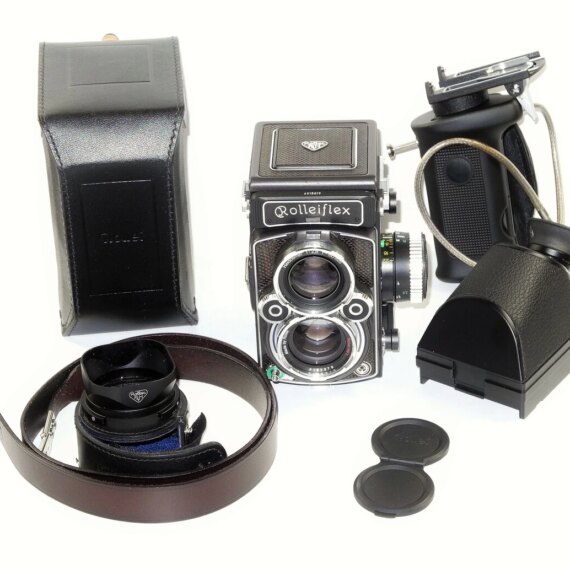 Rollei 2,8 FX camera W/80/2,8mm Planar lens+ Rollei Prism,case,Hand-grip w/cable release,hood,strap,cap,manual,in boxes Mint/- free shipping  (USA)
