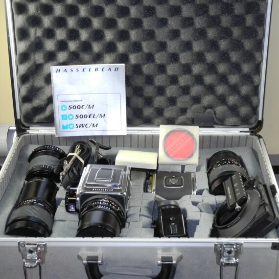 Hasseblad 500 C/M Camera  set with 50mm,150mm,250m CF lenses, filters,grip, pro-shade in metal case Ex++/Mint- / SOLD