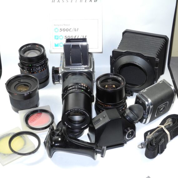Hasseblad 500 C/M Camera  set with 50mm,150mm,250m CF lenses, filters,grip, pro-shade in metal case Ex++/Mint- / SOLD