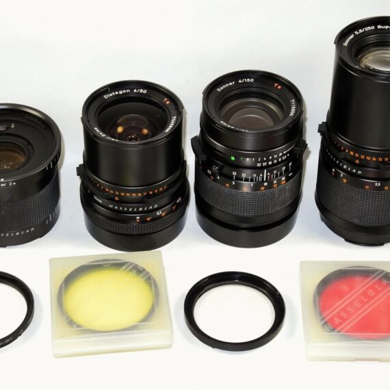 Hasseblad 500 C/M Camera  set with 50mm,150mm,250m CF lenses, filters,grip, pro-shade in metal case Ex++/Mint- / SOLD