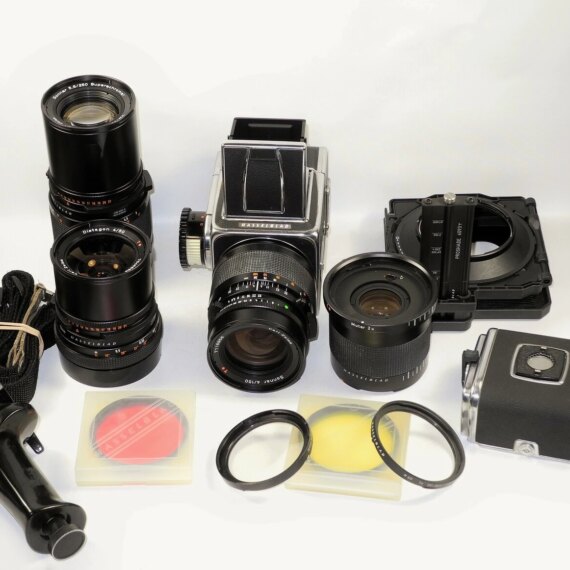 Hasseblad 500 C/M Camera  set with 50mm,150mm,250m CF lenses, filters,grip, pro-shade in metal case Ex++/Mint- / SOLD
