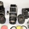 Hasseblad 500 C/M Camera  set with 50mm,150mm,250m CF lenses, filters,grip, pro-shade in metal case Ex++/Mint- / SOLD