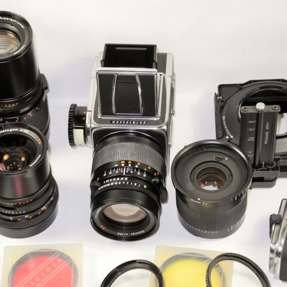 Hasseblad 500 C/M Camera  set with 50mm,150mm,250m CF lenses, filters,grip, pro-shade in metal case Ex++/Mint- / SOLD