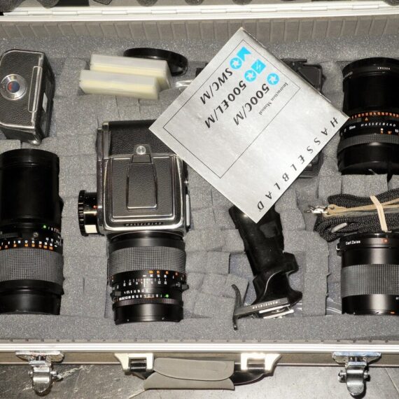 Hasseblad 500 C/M Camera  set with 50mm,150mm,250m CF lenses, filters,grip, pro-shade in metal case Ex++/Mint- / SOLD