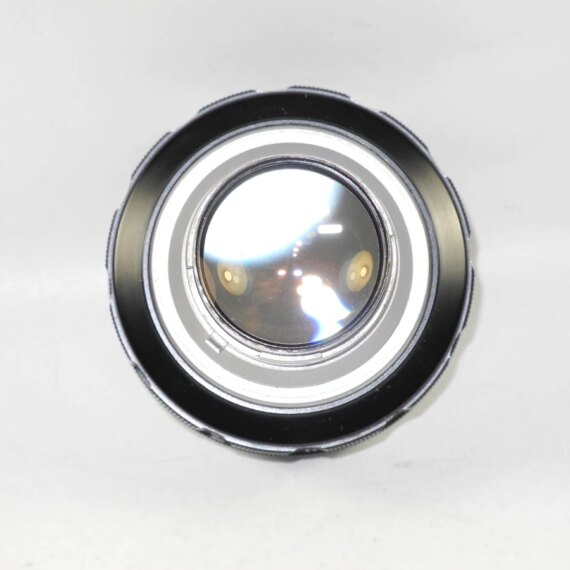 Nikon 5cm f1,1 Nikkor N.C with hood in  case with caps Ex++/Mint- RARE /SOLD