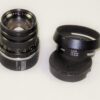 Leica 50/2 Summicron-M black lens cat #11817 (1970) Type III Sold with Leica 12585 metal hood,filter & caps Ex++/Mint-