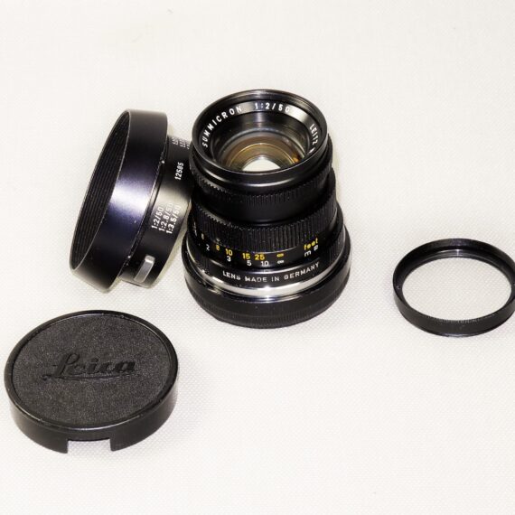 Leica 50/2 Summicron-M black lens cat #11817 (1970) Type III Sold with Leica 12585 metal hood,filter & caps Ex++/Mint-
