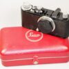 Leica Standard (E) black camera  (1937-38) with Leica 50/3,5 Nickel Elmar in Leica NY camera red case. Ex+/Ex++  Nice set / SOLD