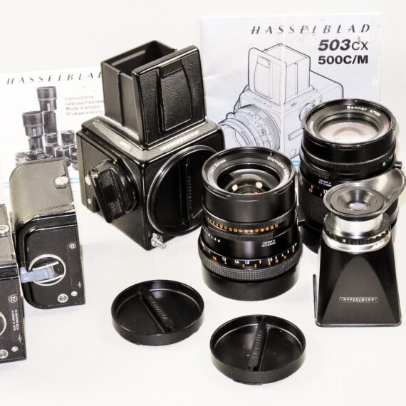 Hasselblad  503 CX black camera with 60mm,150mm CF lenses Two A12 backs,strap,Mag hood,boxes Ex++/M- / SOLD