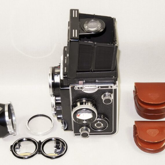 Rolleiflex 2.8F Planar TLR Camera W. Rollei Original Case, Rollei Body Cap, Rollei filter & Hood Mint- / SOLD