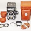 Rolleiflex 2.8F Planar TLR Camera W. Rollei Original Case, Rollei Body Cap, Rollei filter & Hood Mint- / SOLD