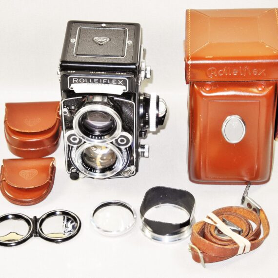 Rolleiflex 2.8F Planar TLR Camera W. Rollei Original Case, Rollei Body Cap, Rollei filter & Hood Mint- / SOLD