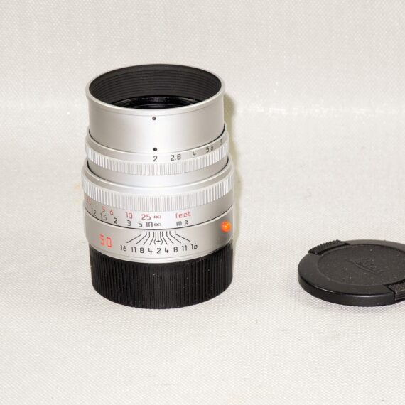 Leica 50/2 Summicron-M chrome latest E39 M lens, W/built in hood & with Leica caps Mint- / Free shipping (USA)