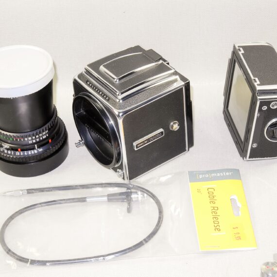 Hasselblad 500 CM chrome camera With Hasselblad 50mm lens, A12 Magazine Mint- / SOLD