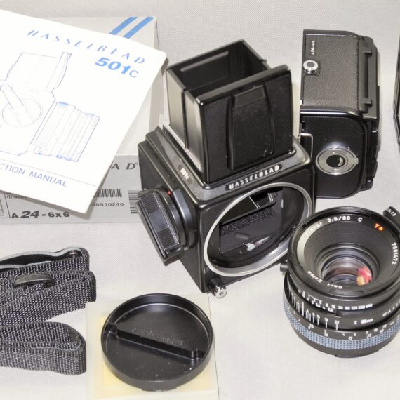 Hasselblad 501C black camera set W/80mm lens+UV filter, A12 & A24 film backs, Strap, cap & system case Mint/-SOLD