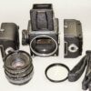 Hasselblad 501C black camera set W/80mm lens+UV filter, A12 & A24 film backs, Strap, cap & system case Mint/-SOLD
