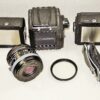 Hasselblad 501C black camera set W/80mm lens+UV filter, A12 & A24 film backs, Strap, cap & system case Mint/-SOLD
