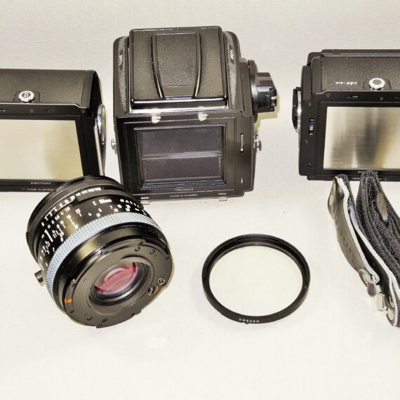 Hasselblad 501C black camera set W/80mm lens+UV filter, A12 & A24 film backs, Strap, cap & system case Mint/-SOLD