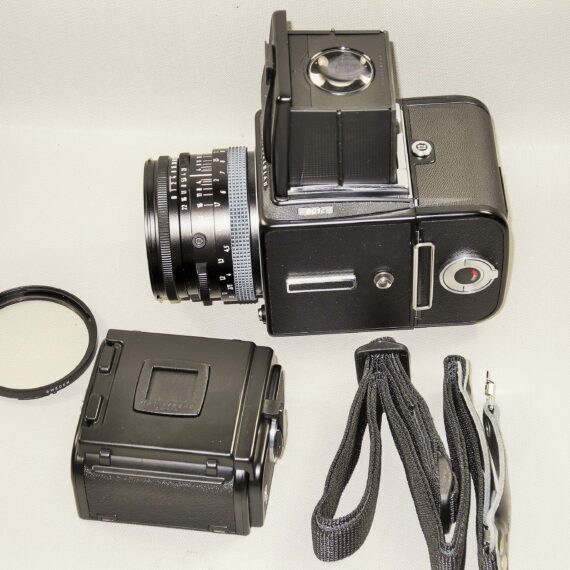 Hasselblad 501C black camera set W/80mm lens+UV filter, A12 & A24 film backs, Strap, cap & system case Mint/-SOLD