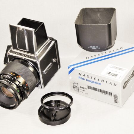Hasselblad 500cm chrome camera W/Hasselblad 120/4 Makro-Planar CF T* lens, A12 mag, filter, hood, caps Mint- / SOLD