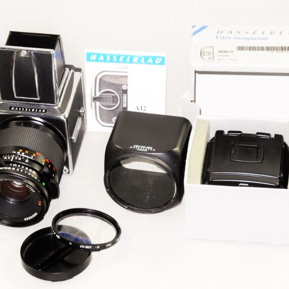 Hasselblad 500cm chrome camera W/Hasselblad 120/4 Makro-Planar CF T* lens, A12 mag, filter, hood, caps Mint- / SOLD