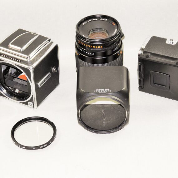 Hasselblad 500cm chrome camera W/Hasselblad 120/4 Makro-Planar CF T* lens, A12 mag, filter, hood, caps Mint- / SOLD