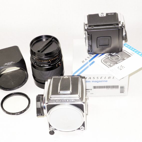 Hasselblad 500cm chrome camera W/Hasselblad 120/4 Makro-Planar CF T* lens, A12 mag, filter, hood, caps Mint- / SOLD