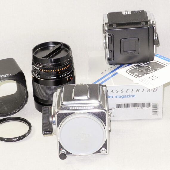 Hasselblad 500cm chrome camera W/Hasselblad 120/4 Makro-Planar CF T* lens, A12 mag, filter, hood, caps Mint- / SOLD