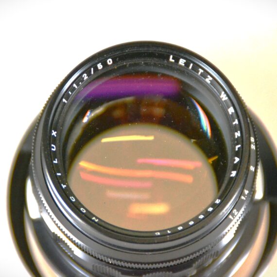 Leica 50mm f/1,2 Noctilux -M Original RARE M lens (circa 1967) Sold with: Leica original Metal Hood,caps and plastic case Ex++/M- /RARE lens- Free Shipping (Worldwide) Accepting offers !