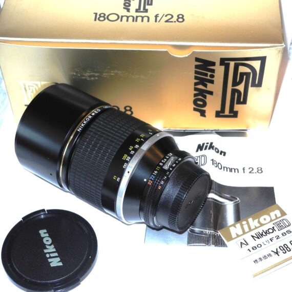 Nikon 180mm f/2.8  Nikkor*ED AIS  (E72) with built in hood, caps,box,manual Mint-