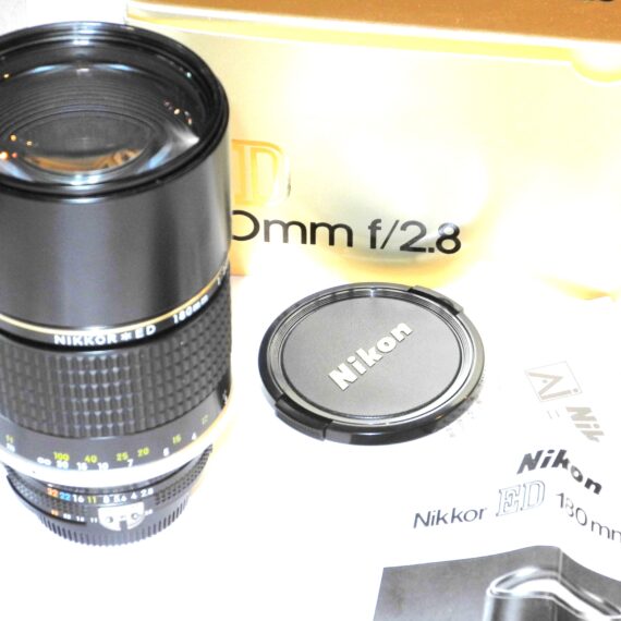 Nikon 180mm f/2.8  Nikkor*ED AIS  (E72) with built in hood, caps,box,manual Mint-