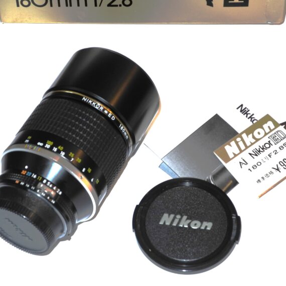 Nikon 180mm f/2.8  Nikkor*ED AIS  (E72) with built in hood, caps,box,manual Mint-