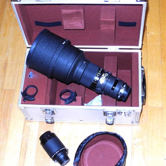 Nikon 300mm f/2,8 Nikkor ED AIS with hood,caps,extra filter holder & Nikon TC-301Teleconverter inside metal trunk Mint- lens