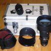 Nikon 300mm f/2,8 Nikkor ED AIS with hood,caps,extra filter holder & Nikon TC-301Teleconverter inside metal trunk Mint- lens