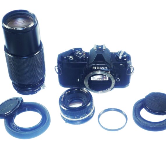 Nikon FM black 35mm mechanical camera with Nikon 50mm lens and Vivitar 80–200mmzoom lens Ex++